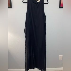 Long black sheer dress. Great for parties. Daytime brunch.